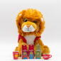 Lion stuffed animal with mini keychains in front